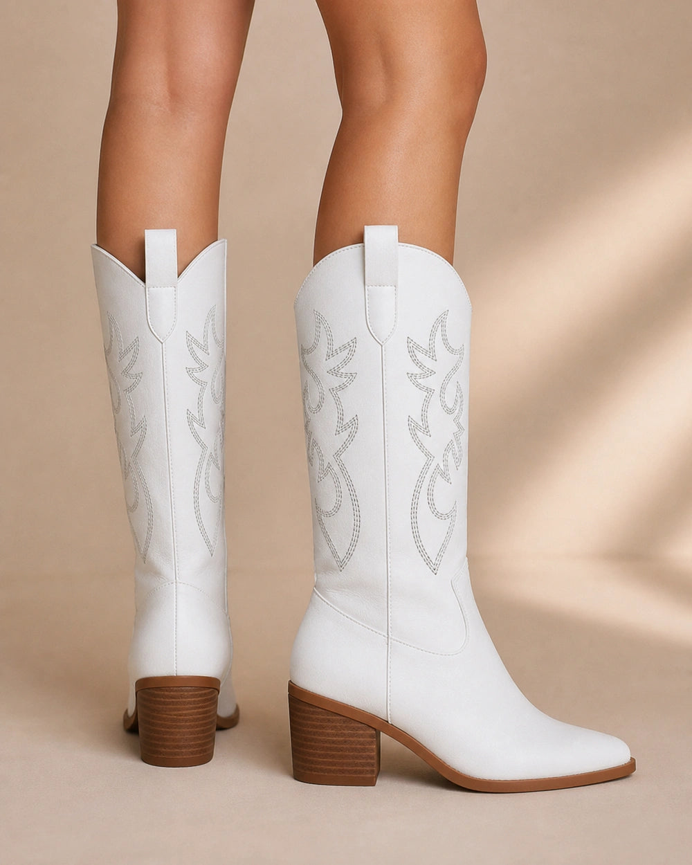 Exact plain white embroidered Western knee-high boots, rear view.