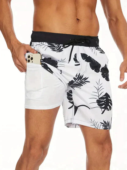 Bañadores de Hombre – Bañador Azul Marino con Estampado de Palmeras y Forro de Malla