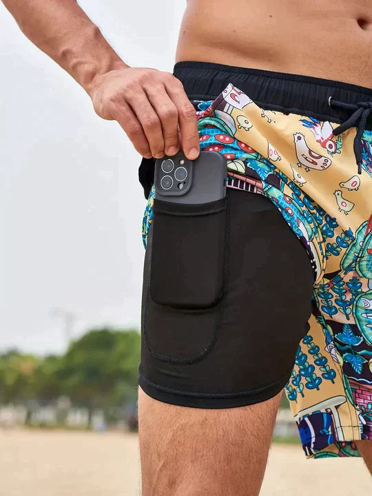 Bañadores de Hombre – Bañador Azul Marino con Estampado de Palmeras y Forro de Malla
