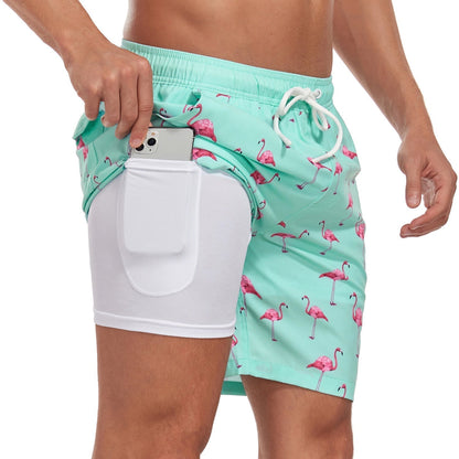 Bañadores de Hombre – Bañador Azul Marino con Estampado de Palmeras y Forro de Malla