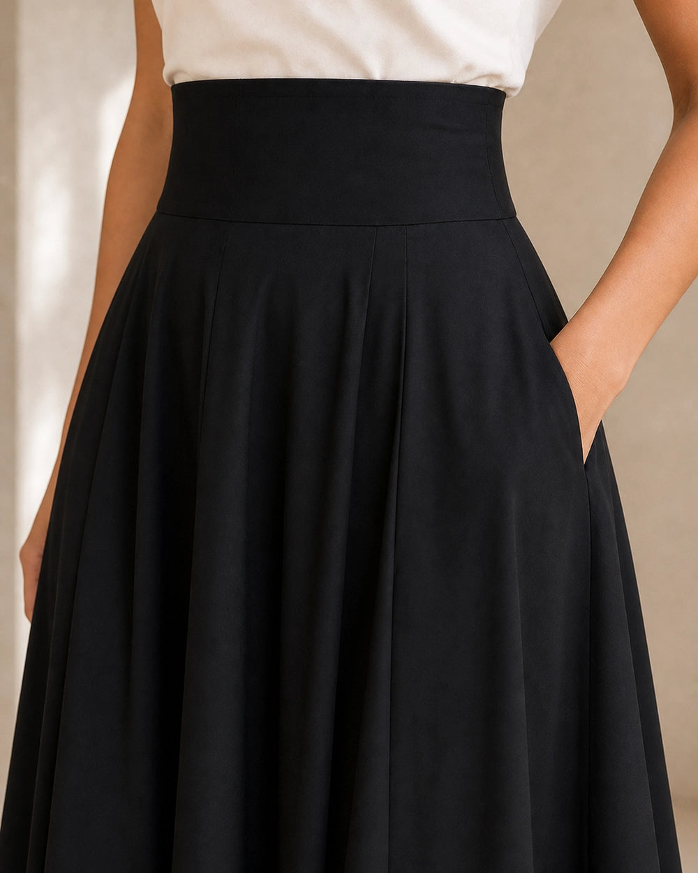 Women's High-Waist Bow Midi Skirt with Pockets — image 5 — gonna-midi-elegante-ideale-per-autunno-e-primavera-black-05-construction-detail.webp