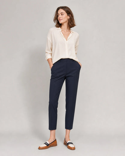 Women's Brown and Cream Round-Toe Loafers — worn by a model