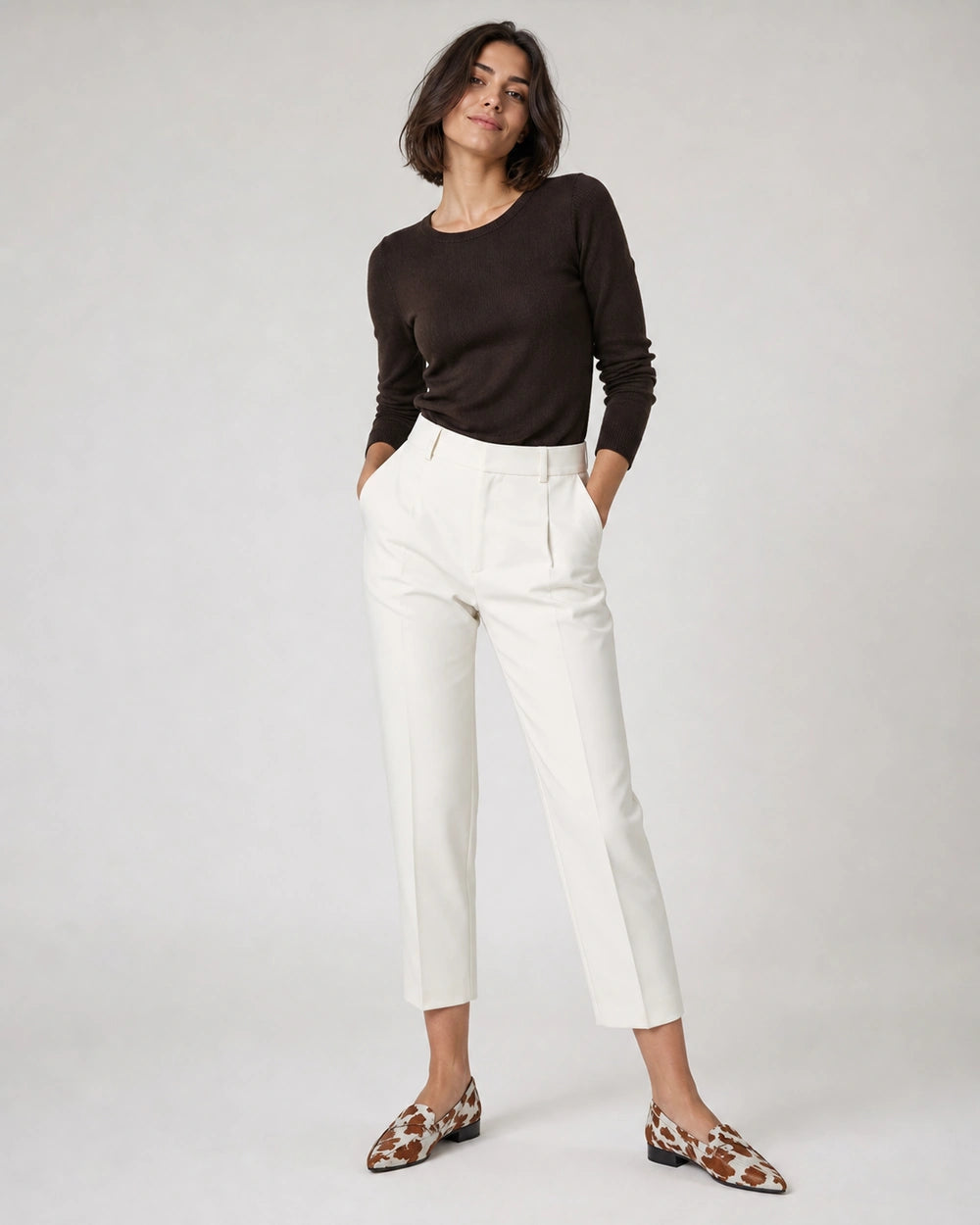 Women's Pointed Cow-Print Loafers — worn by a model