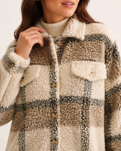 Beige checked teddy shirt coat, collar pocket and button detail.
